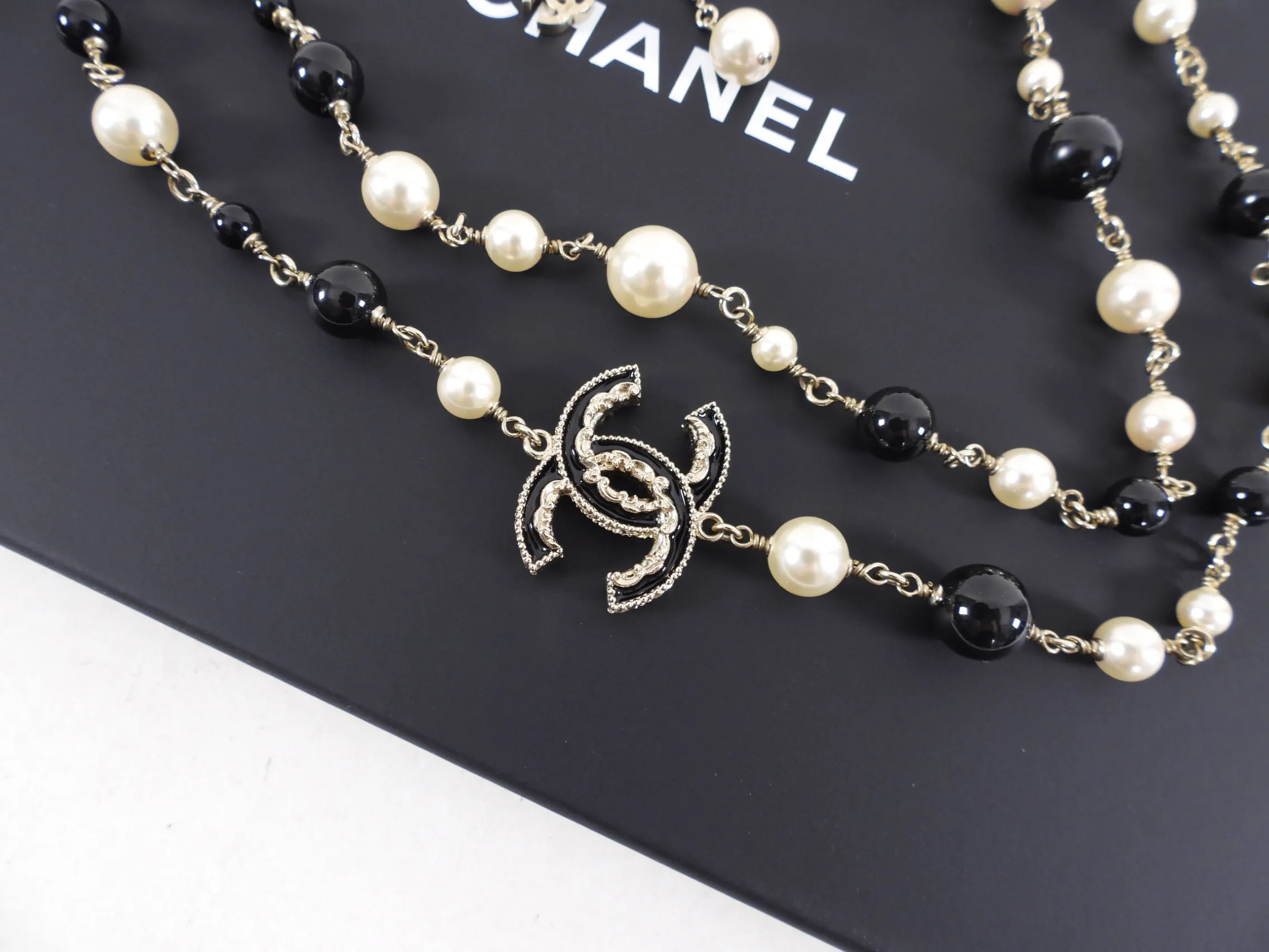 Chanel 14B Stunning Long Pearl Gripoix CC Enamel Necklace - Exquisite and Timeless Jewelry Piece